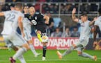 Minnesota United forward Teemu Pukki attempted a shot on goal in front of St. Louis City defender Jake Nerwinski in the first half Saturday