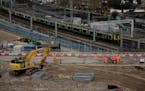 A train passes the construction site of the High Speed 2 (HS2) rail line at Euston station in London, Tuesday, Feb. 11, 2020. 