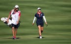 United States’ Ally Ewing walked on the 16th hole during her singles match at the Solheim Cup on Sunday.