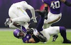 Chargers receiver Keenan Allen was upended by Vikings safety Harrison Smith after one of his 18 receptions Sunday.