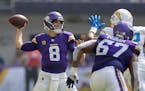 Vikings quarterback Kirk Cousins looked to throw against the Chargers on Sunday at U.S. Bank Stadium.