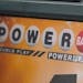 FILE - A display panel advertises tickets for a Powerball drawing at a convenience store, Nov. 7, 2022, in Renfrew, Pa. The ninth-largest lottery jack