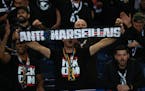 PSG fans cheers ahead of the French League One soccer match between Paris Saint Germain and Olympique de Marseille at Parc des Princes stadium in Pari
