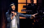 In this Nov. 3, 2012 file photo, comedian Russell Brand performs at “Eddie Murphy: One Night Only,” at the Saban Theater in Beverly Hills, Calif.