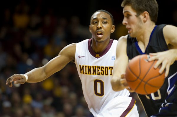 Al Nolen, left, played guard for the Gophers from 2007-11 and now will be part of their radio broadcasting crew.