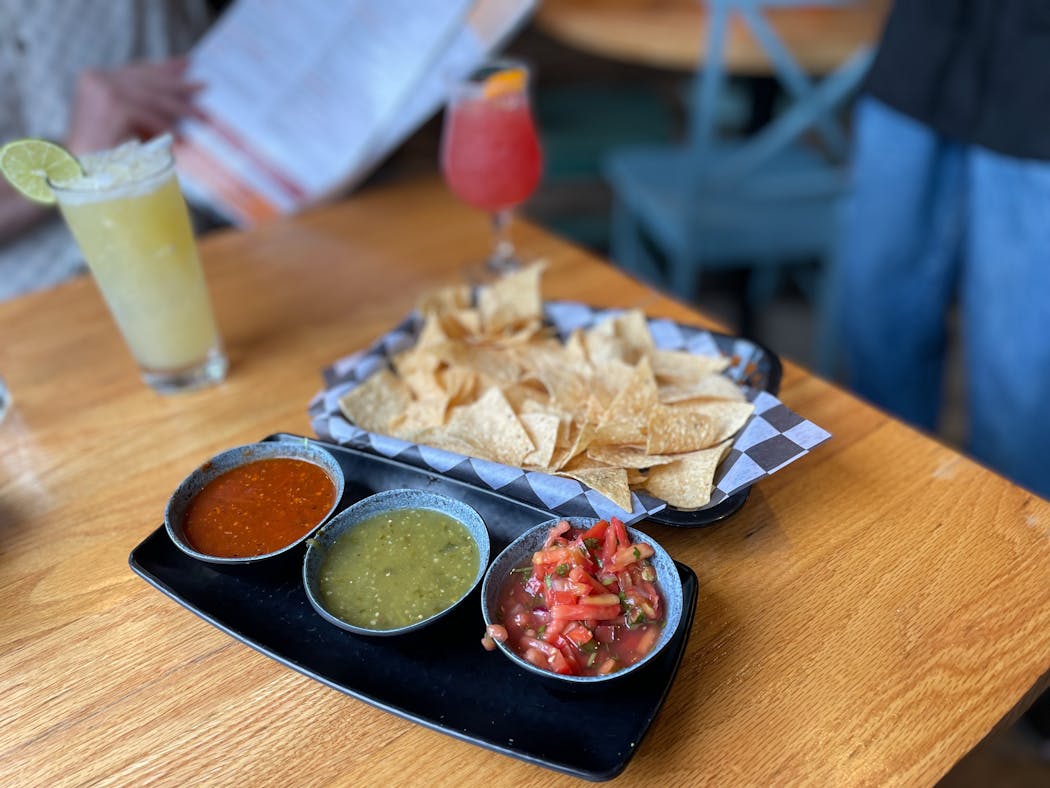 A trio of salsas, a basket of chips and a margarita are all that’s needed.