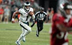 Eagles quarterback Jalen Hurts took off running during the second half against Tampa Bay.