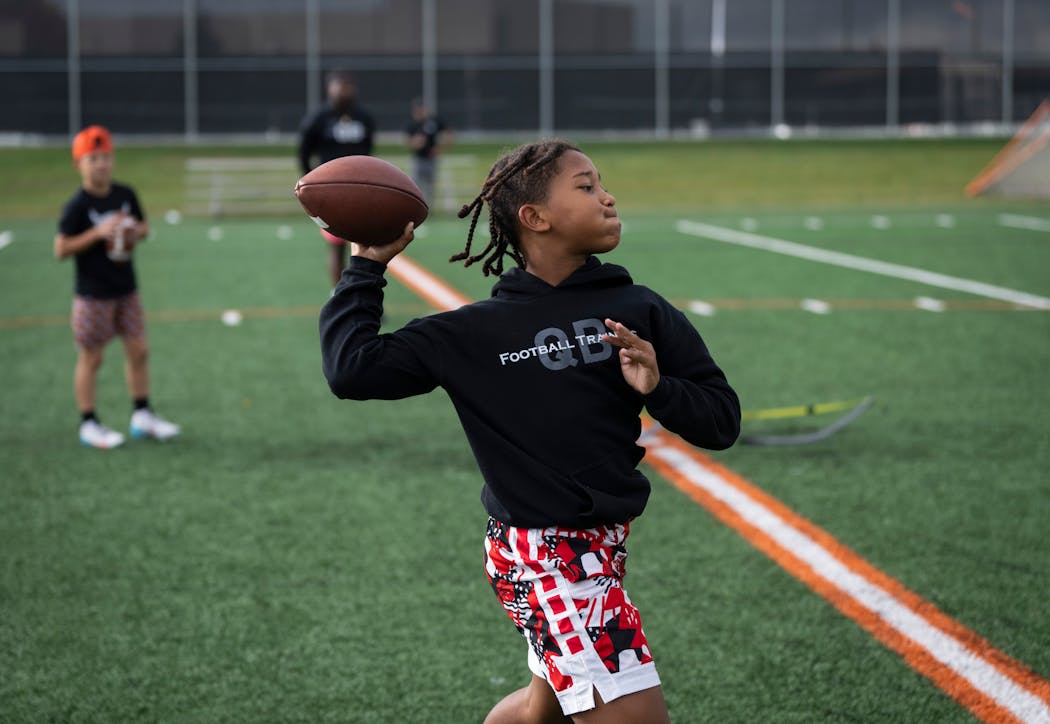 Ellis McCoy is the 9-year-old son of Cleveland McCoy, who runs a quarterback training company.