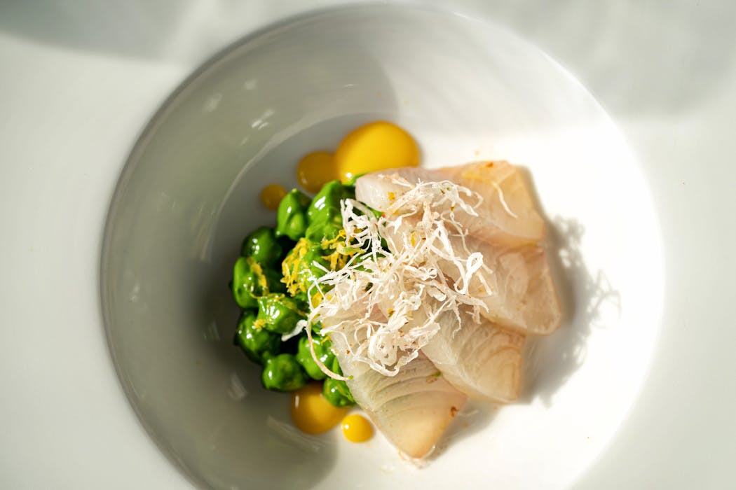 Cured Hiramasa, yuzu kosho, fried squid, green chickpeas at Erik Skaar’s restaurant Vann.