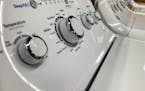 General Electric washing machines are displayed at a retailer, Friday, Sept. 15, 2023, in Marietta, Ga. On Tuesday, the Conference Board reports on U.