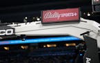 A Bally Sports advertisement is viewed on a backboard support during an NBA game last season in Orlando.