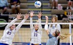 Katie Kelzenberg (27) and Avery Jesewitz (17) of Wayzata attempted to block Carly Gilk (7) of Champlin Park on Tuesday at Wayzata High School in Plymo