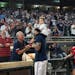 Carlos Correa greeted fans on Friday night after the Twins clinched the AL Central. He’s expected to return to health in time for the playoffs.