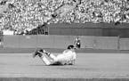 Baltimore third baseman Brooks Robinson makes a diving catch for a line drive during the 1970 World Series against Cincinnati.