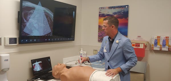 Ryan Aga, director of simulation at HealthPartners Institute, demonstrated how clinicians can practice diagnostic decisions on high-tech mannequins to