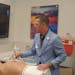 Ryan Aga, director of simulation at HealthPartners Institute, demonstrated how clinicians can practice on high-tech mannequins to increase accuracy an