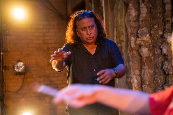 Dipankar Mukherjee at work in the theater.