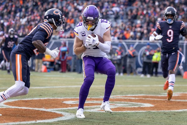 Adam Thielen caught one of his last touchdown passes for the Vikings against the Bears in January. He was released in March and signed by Sunday’s o