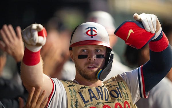 Twins designated hitter Ryan Jeffers was congratulated in the dugout after he knocked a two-run homer in the sixth inning to tie the score Wednesday. 