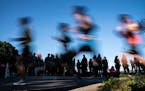 Runners ran past spectators as they approached mile eight during the 2019 Medtronic Twin Cities Marathon in Minneapolis, Minn., on Sunday, October 6, 