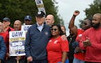 President Joe Biden joins a picket line with members of the United Auto Workers (UAW) union at a General Motors Service Parts Operations plant in Bell