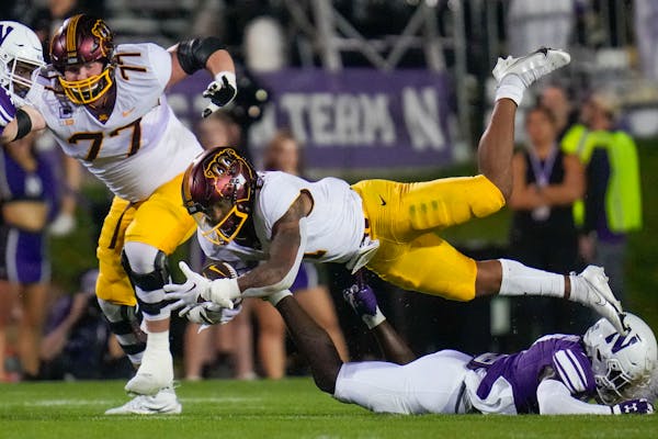 Darius Taylor rushed for 198 yards against Northwestern but missed overtime of the loss with a leg injury.