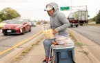 Rosa (who did not want to give her last name), who is a recent immigrant from Ecuador sold fruit near a medium and busy street in Minneapolis, Minn., 