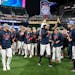 Twins players and staff celebrate after winning the American League Central title. The Minnesota Twins hosted the Los Angeles Angels at Target Field o
