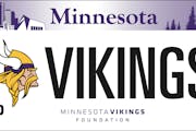 The commemorative purple and white plates come with a $30 fee on top of the regular license plate charges.