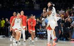 Las Vegas Aces guard Chelsea Gray celebrated with guard Kierstan Bell, behind, after the team’s win over the Dallas Wings in Game 3