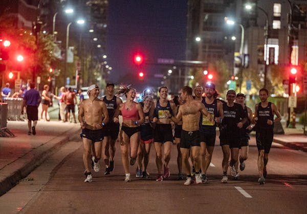 Runners warmed up and decided to run their own race at the start of the 10-mile in Minneapolis on Sunday after the Twin Cities Marathon was canceled.