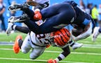Bengals safety Nick Scott hit Titans wide receiver Nick Westbrook-Ikhine on Sunday in Nashville.