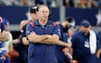 Patriots coach Bill Belichick took in the second half of Sunday’s blowout loss to the Cowboys in Arlington, Texas.