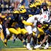 Michigan’s defense swallowed up Rutgers running back Kyle Monangai during the Sept. 23 game in Ann Arbor.