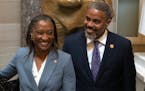 Sen. Laphonza Butler, D-Calif., left, reacts after being sworn into the Congressional Black Caucus by Rep. Steven Horsford, D-Nev., right, in front of