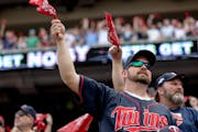 Twins fans swept in the postseason excitement have brought some liveliness and an economic jolt to downtown Minneapolis.