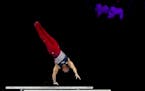 The United States’ Asher Hong competed on the parallel bars during the world championships in Antwerp, Belgium, on Tuesday.