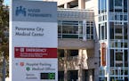 A Kaiser Permanente sign stands outside the hospital in the Panorama City section of Los Angeles on Tuesday, Oct. 3, 2023. Roughly 75,000 health care 