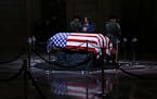 Mayor London Breed prays over the casket of Senator Dianne Feinstein at San Francisco City Hall before a public viewing in San Francisco on Wednesday,