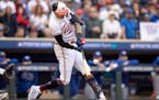 The Twins’ Carlos Correa connects for an RBI single in the fourth inning during Game 2 of the AL wild-card series against the Blue Jays on Wednesday