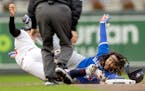 Twins shortstop Carlos Correa applied the tag as Toronto’s Vladimir Guerrero Jr. was picked off second base in the fifth inning Wednesday.