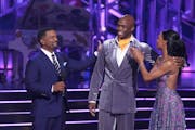 Alfonso Ribeiro congratulates Adrian Peterson and Britt Stewart on “Dancing With the Stars.”