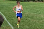 Eddie Snider of Mounds Park Academy recently outdueled Heritage Christian’s Lev Dougherty at the finish line to win the Class 1A, Section 4 cross-co