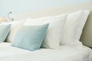 One difference between men and women: the number of pillows on a bed.