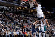 The Timberwolves’ Anthony Edwards dunked the ball Wednesday night during Minnesota’s 110-89 win over Denver. Edwards scored 24 points.