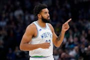 The Wolves’ Karl-Anthony Towns (23 points) reacted after he made a three-pointer Wednesday night against New Orleans at Target Center. Minnesota won