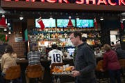It was a busy afternoon last Sunday as fans watched the Vikings-Saints game at the Smack Shack bar at the Potluck food hall in Rosedale Center in Rose