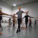 Matthew LaVoie holds on to the barre during a Boomer Ballet class inside the St. Paul Ballet studio Nov. 7. 