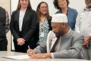 Imam Mohamed Mahad of the Nurul-Iman Mosque in Minneapolis signed a fatwa document Thursday permitting Muslim parents to use donor breast milk for the