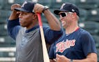 Torii Hunter and Michael Cuddyer are special coaches for the Twins; they enjoyed a laugh during spring training in 2020.